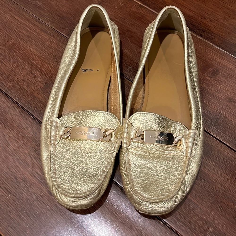 Women's Gold COACH loafers. EUC.